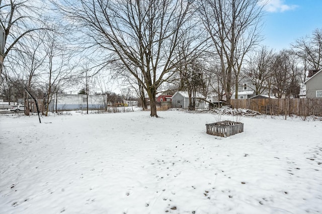 view of yard covered in snow