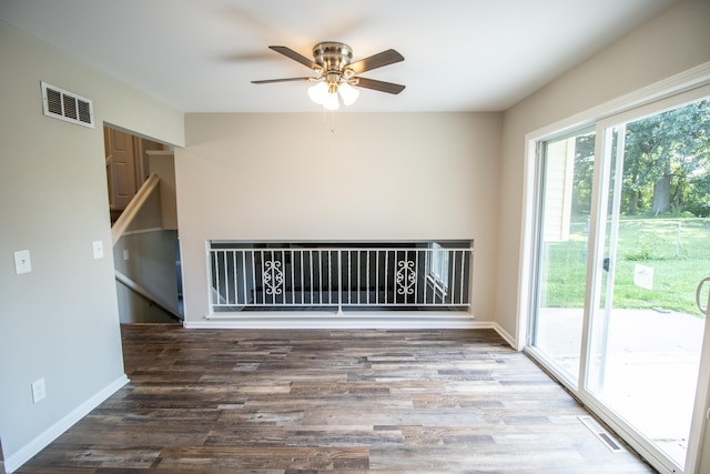 spare room featuring ceiling fan and wood-type flooring