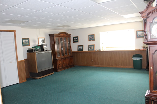 29352 Medburn Ct, Farmington Hills, MI 48336 - interior space with a wainscoted wall, a paneled ceiling, wooden walls, and carpet floors