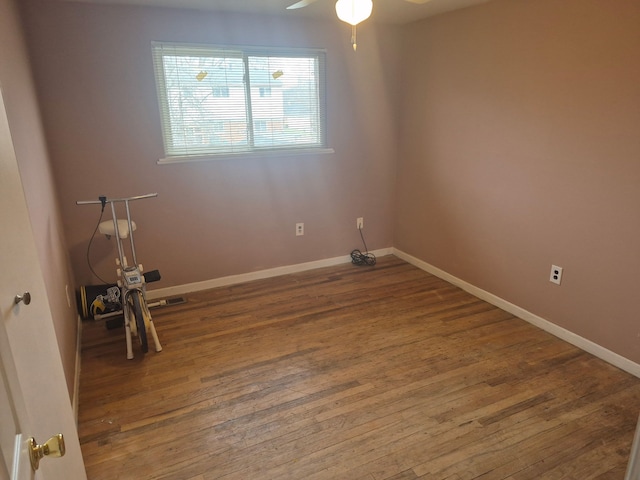 29352 Medburn Ct, Farmington Hills, MI 48336 - empty room featuring baseboards, wood-type flooring, and ceiling fan