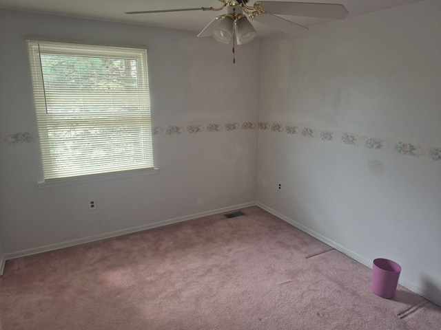 29352 Medburn Ct, Farmington Hills, MI 48336 - unfurnished room with visible vents, baseboards, carpet, and a ceiling fan