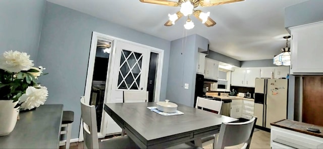 dining room featuring a notable chandelier