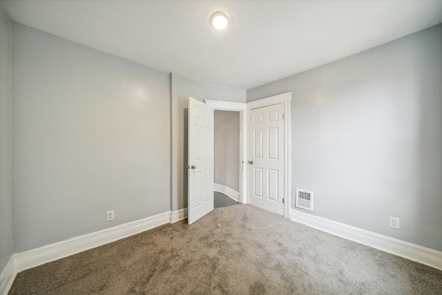 unfurnished bedroom with carpet