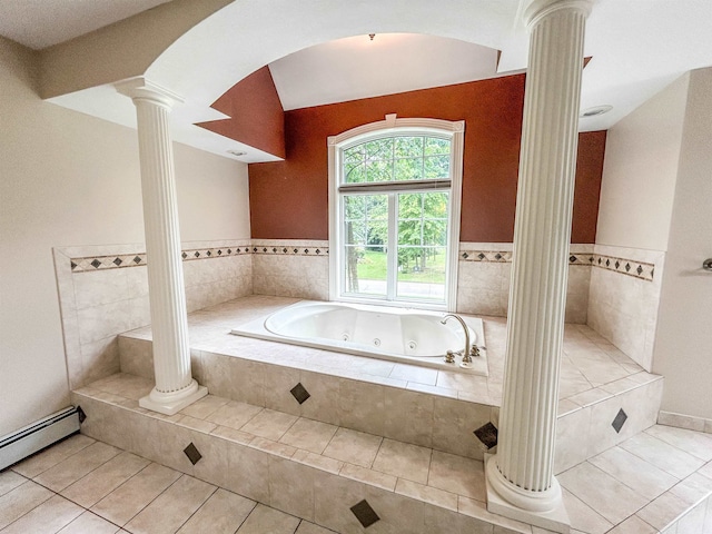 bathroom with decorative columns, tiled tub, tile patterned flooring, and baseboard heating