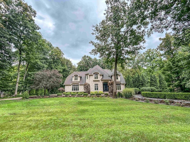 view of front of home with a front yard