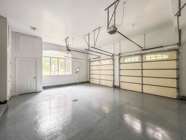 garage featuring a garage door opener