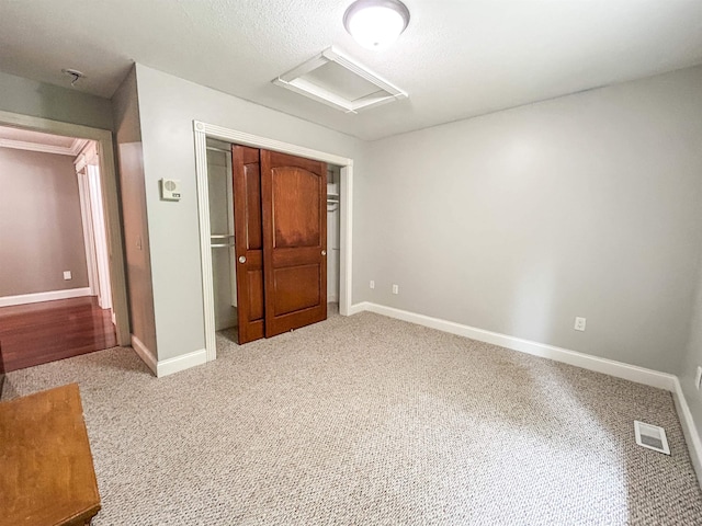 unfurnished room featuring light colored carpet