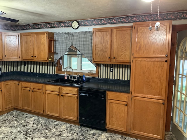 kitchen featuring ceiling fan, sink, a textured ceiling, and black dishwasher