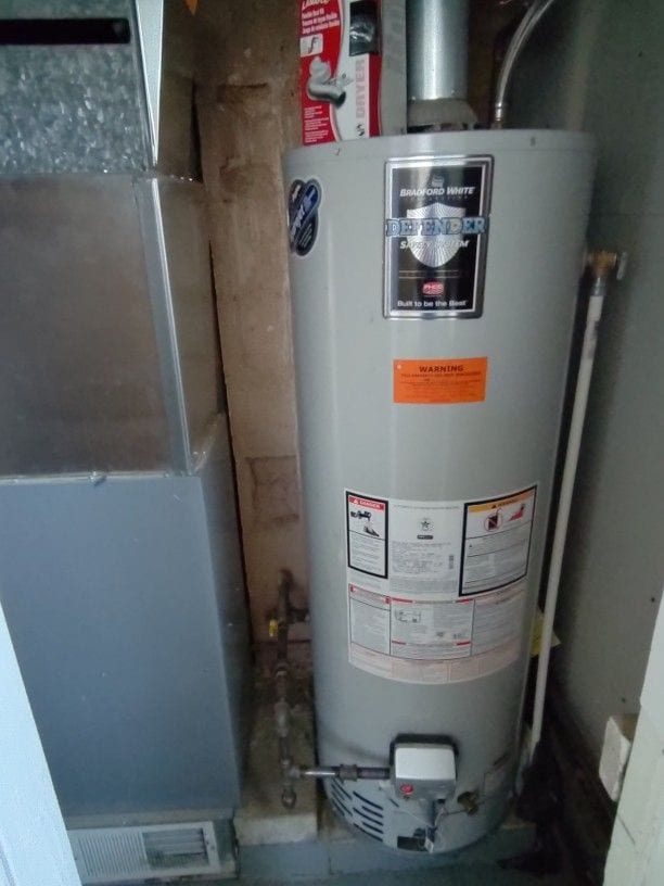 utilities with heating unit and water heater