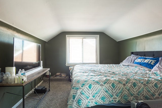 carpeted bedroom featuring vaulted ceiling