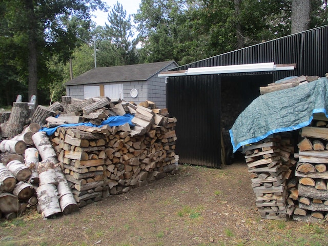 exterior space with a storage shed