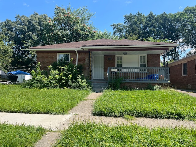 19366 Fenelon St, Detroit, MI 48234 - view of front of property with covered porch and brick siding