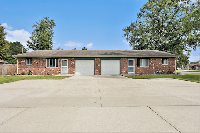 single story home featuring a garage