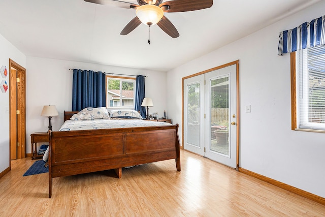 bedroom featuring ceiling fan, light wood-type flooring, and access to outside