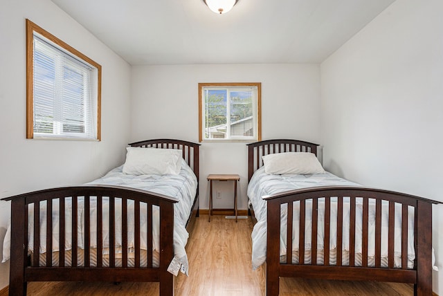 bedroom featuring hardwood / wood-style flooring