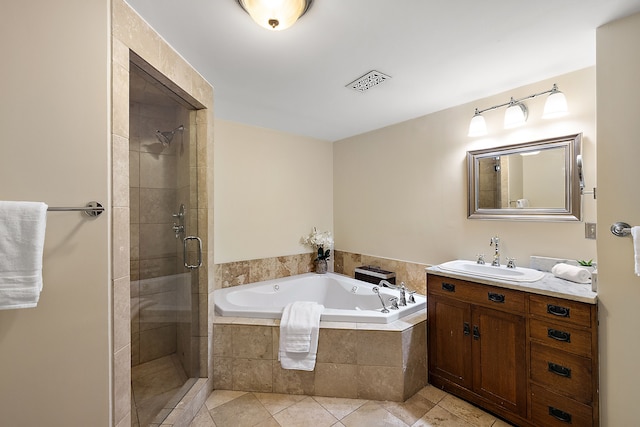 bathroom with tile patterned flooring, vanity, and plus walk in shower