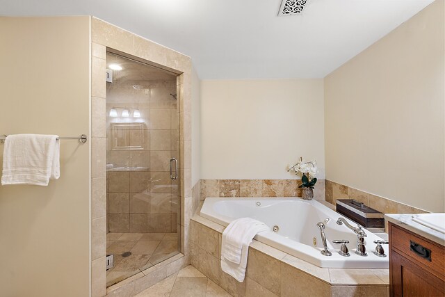 1395 Antietam Ave Unit 51, Detroit, MI 48207 - full bathroom featuring a whirlpool tub, vanity, a stall shower, and tile patterned flooring