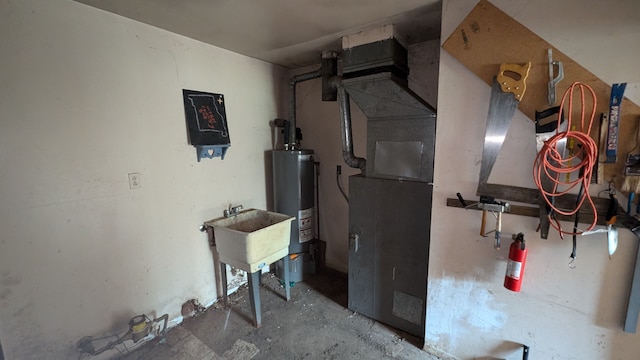 14025 Dacosta St, Detroit, MI 48223 - utility room with water heater and a sink
