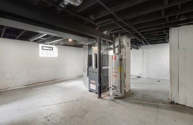 basement with gas water heater and heating unit