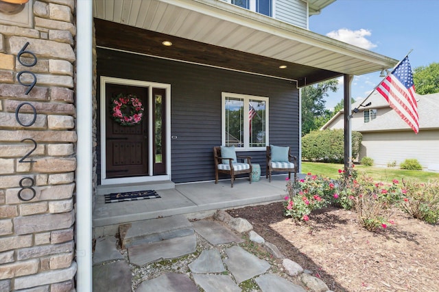 property entrance featuring a porch