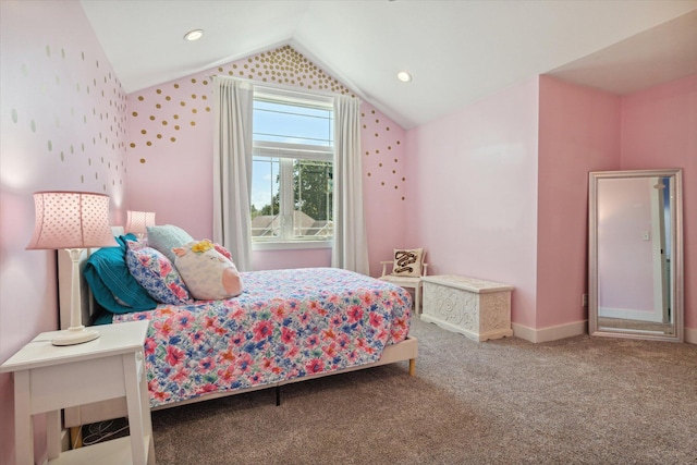 carpeted bedroom featuring lofted ceiling