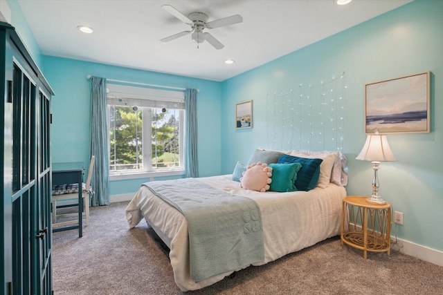 carpeted bedroom with ceiling fan