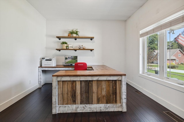 bar with wooden counters and dark wood-type flooring