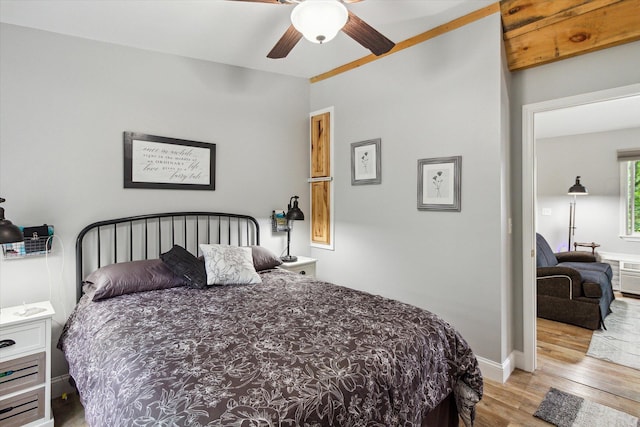 bedroom featuring ceiling fan and light wood-type flooring