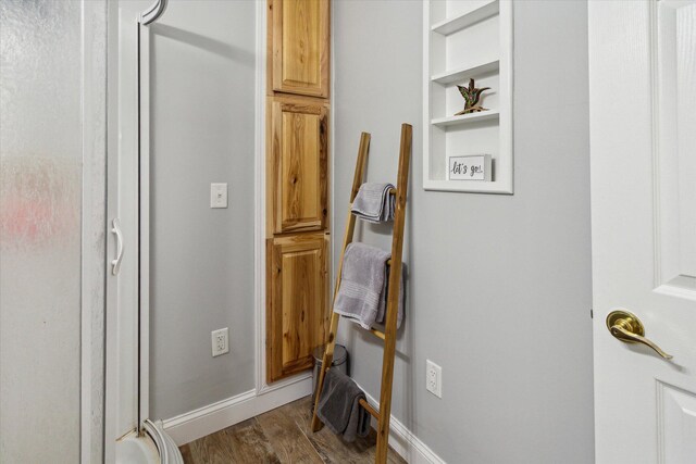 8529 N Blair Dr, Bitely, MI 49309 - hall featuring wood finished floors and baseboards