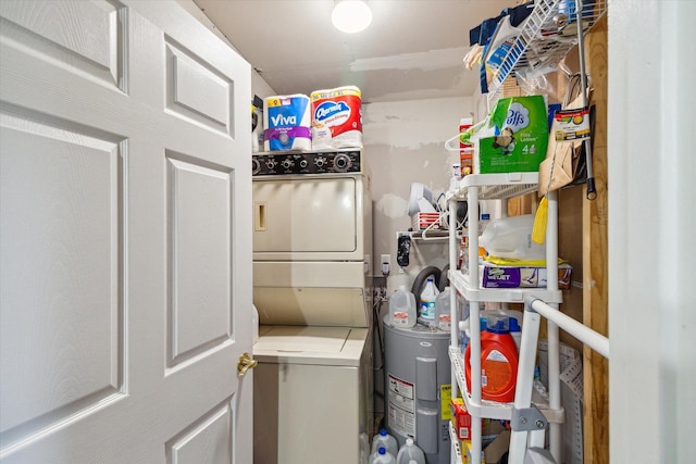 laundry area with stacked washer / dryer