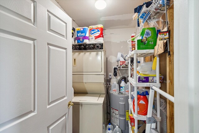 8529 N Blair Dr, Bitely, MI 49309 - laundry room featuring stacked washing machine and dryer
