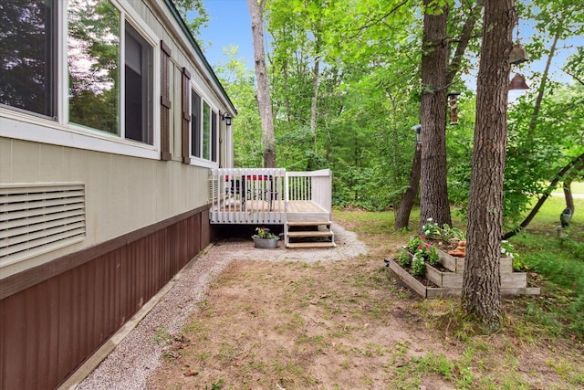 view of yard featuring a deck