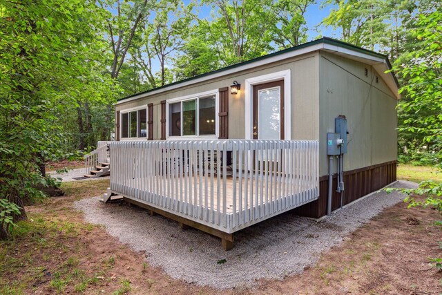 8529 N Blair Dr, Bitely, MI 49309 - view of front of home featuring a deck