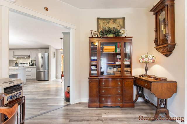 hallway featuring light wood-type flooring