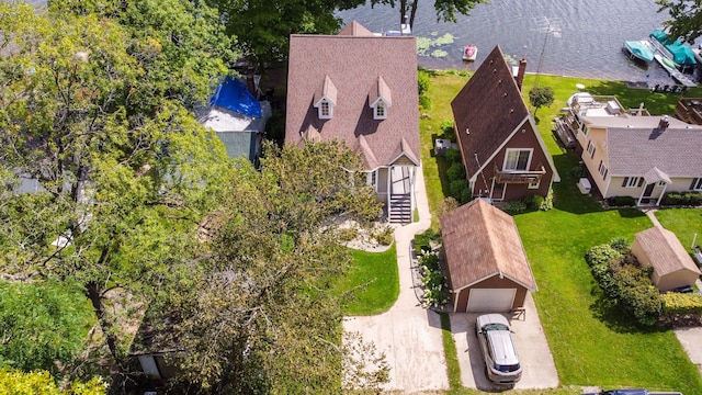 birds eye view of property featuring a water view