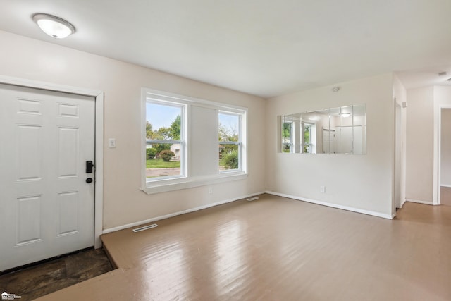 foyer with dark hardwood / wood-style flooring