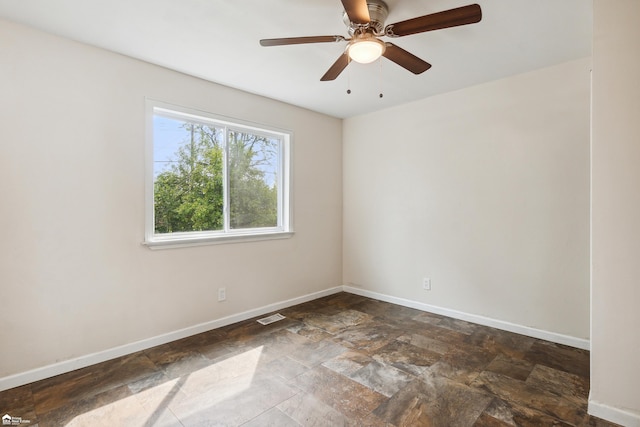 empty room with ceiling fan