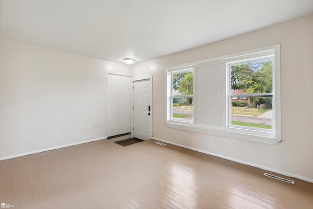 empty room featuring wood-type flooring