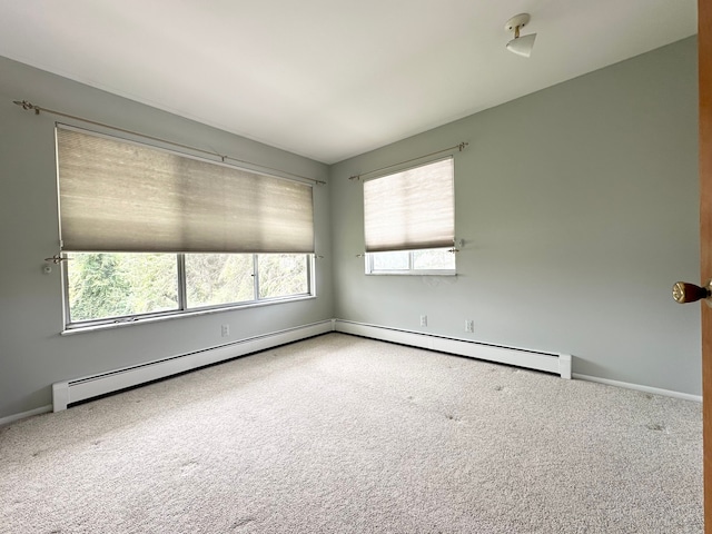 spare room featuring carpet flooring