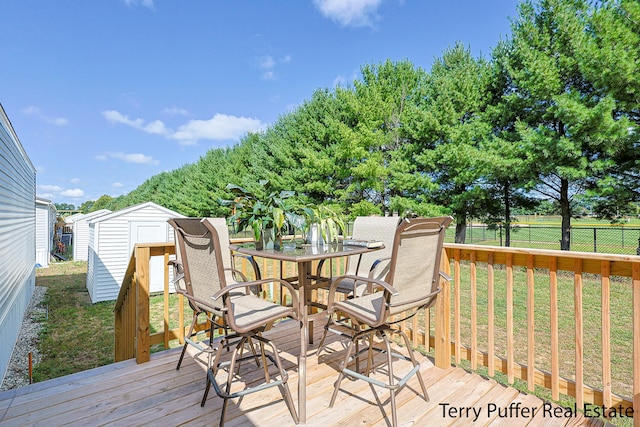 deck featuring a lawn