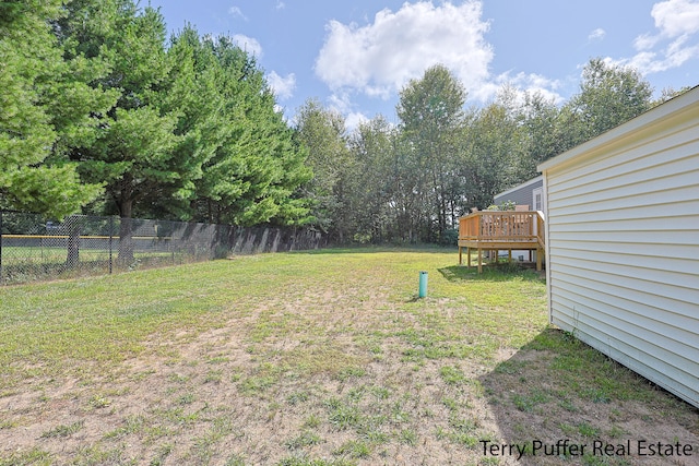 view of yard featuring a deck