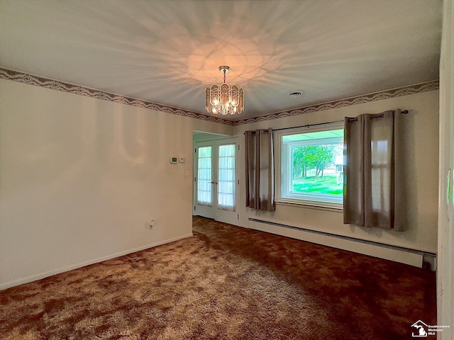 carpeted spare room featuring a notable chandelier, a baseboard radiator, and french doors