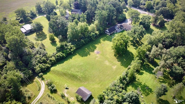 birds eye view of property featuring a rural view