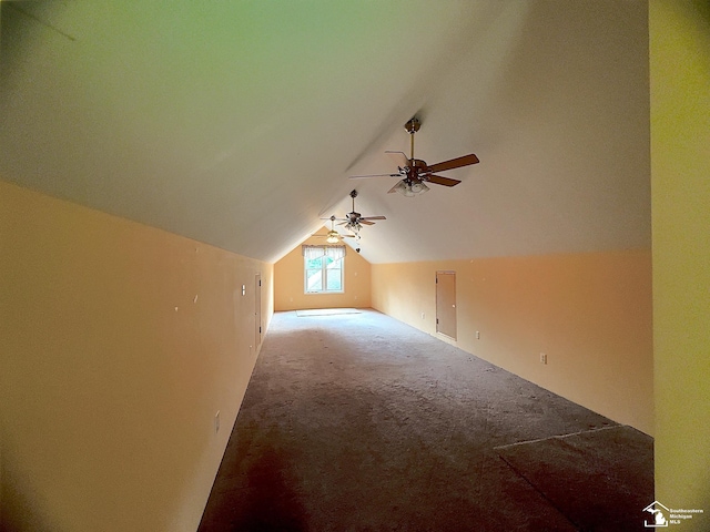 bonus room featuring ceiling fan, carpet floors, and lofted ceiling