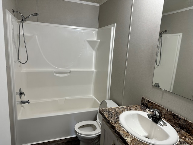 full bathroom featuring hardwood / wood-style flooring, vanity, toilet, and bathtub / shower combination