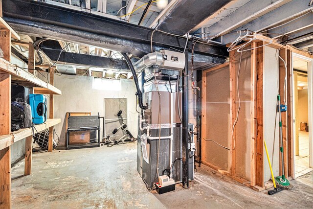 basement featuring heating unit