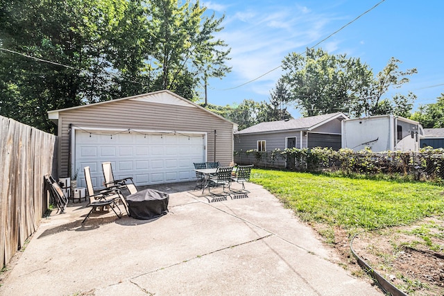 garage featuring a lawn