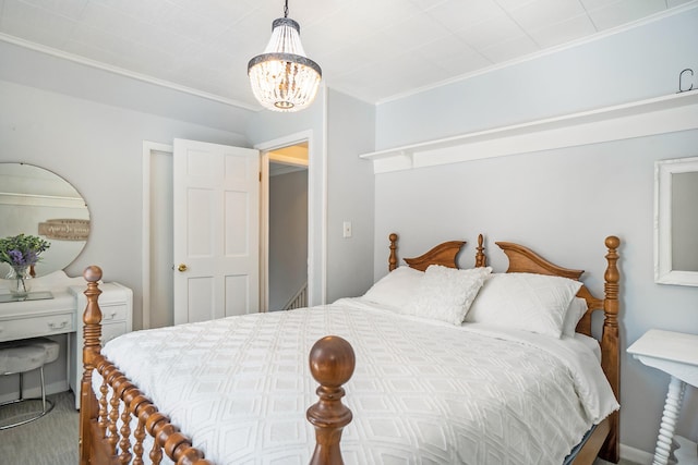 bedroom with a notable chandelier and ornamental molding