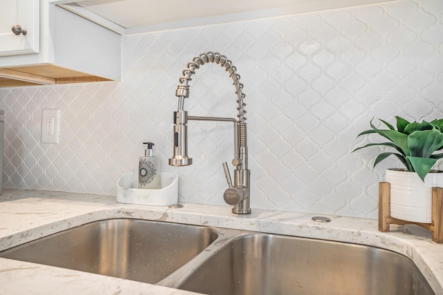 interior details featuring light stone countertops