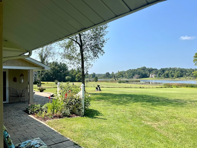 view of yard with a water view